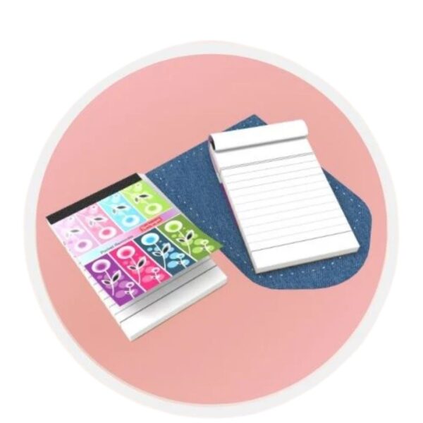 A stack of Neelgagan Pocket Reminders showcasing their compact size and various cloth-bound colors (if applicable).