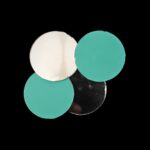 A close-up of a 40mm round glass mirror showing its smooth, polished edge.